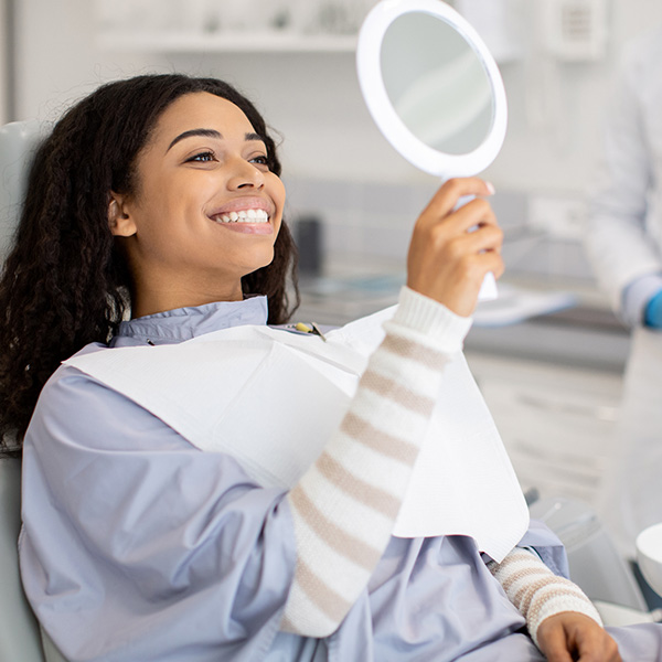 girl siting in dentist chair